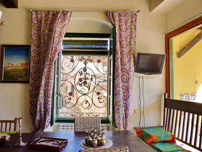 Una televisión o centro de entretenimiento en Caltarragona casa rural