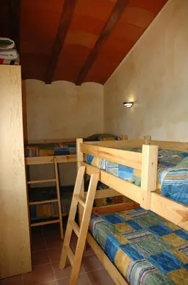 Cama o camas de una habitación en Casa con vistas al lago y con piscina - Casó Nou