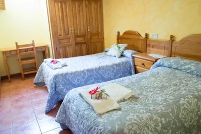 Cama o camas de una habitación en Apartamentos Casa Ruben