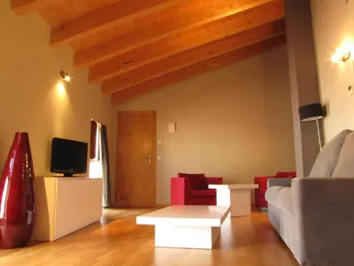 Una televisión o centro de entretenimiento en Hotel Portal Del Matarraña