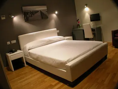 Cama o camas de una habitación en Hotel Portal Del Matarraña