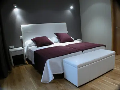 Cama o camas de una habitación en Hotel Portal Del Matarraña