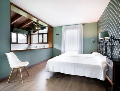 Cama o camas de una habitación en Apartamentos Viña Olivan