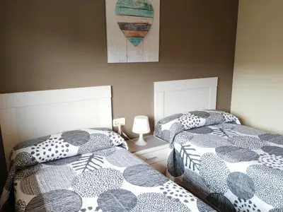 Cama o camas de una habitación en Apartamento turistico Olite