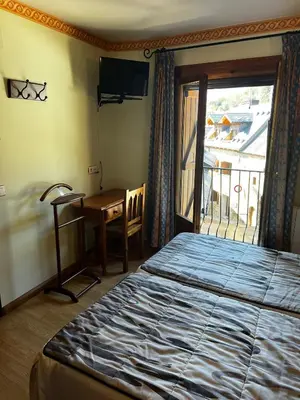 Cama o camas de una habitación en CASA PELENTOS Sandinies