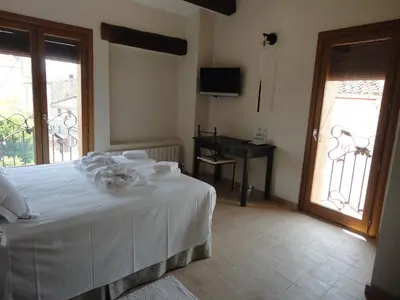 Cama o camas de una habitación en Hotel Rural Cal Torner Adults Only