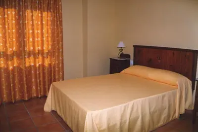 Cama o camas de una habitación en Los Trulls d´Auligué