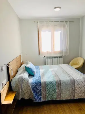Cama o camas de una habitación en Apartamentos Maladeta