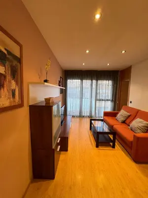 Zona de estar de Apartamentos Turísticos Can Rocamora
