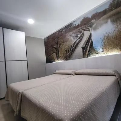 Cama o camas de una habitación en Aparthotel Meseguer