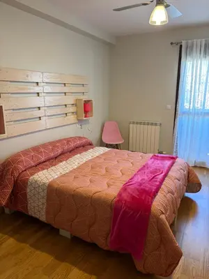 Cama o camas de una habitación en Apartamento Turístico “El Yugo”