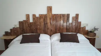 Cama o camas de una habitación en Hostal Casa Barcelo