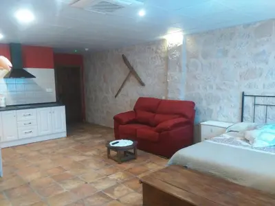 Zona de estar de Apartamentos Calanda