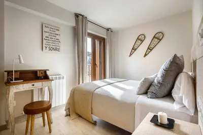 Cama o camas de una habitación en MONTELIA Ático El Ciervo de Panticosa