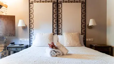 Cama o camas de una habitación en Hotel El Cerco