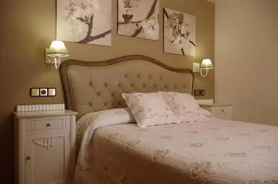 Cama o camas de una habitación en Hostal Vidaller