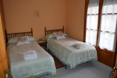 Cama o camas de una habitación en Casa 
