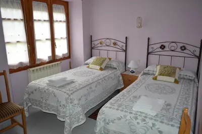 Cama o camas de una habitación en Casa 