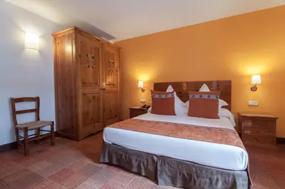Cama o camas de una habitación en Hotel Vilagaros