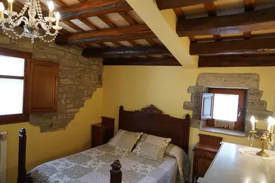 Cama o camas de una habitación en Cal Carulla
