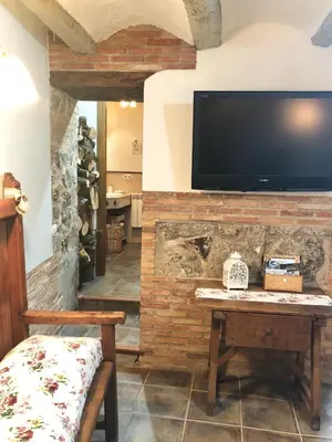 Una televisión o centro de entretenimiento en Apartamento Rural La Serratilla