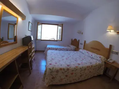 Cama o camas de una habitación en El Pilar