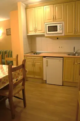 Una cocina o zona de cocina en Apartamentos Fidalgo