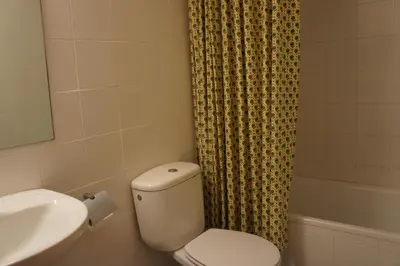 Un baño de Apartamentos Fidalgo