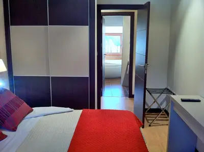 Cama o camas de una habitación en Aparthotel Bubal