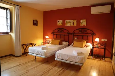 Cama o camas de una habitación en Hotel Rural El Almadiero