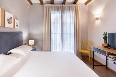 Cama o camas de una habitación en Hostal Pichorradicas