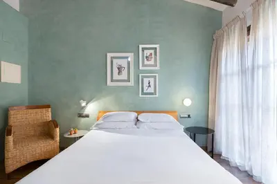 Cama o camas de una habitación en Hostal Pichorradicas