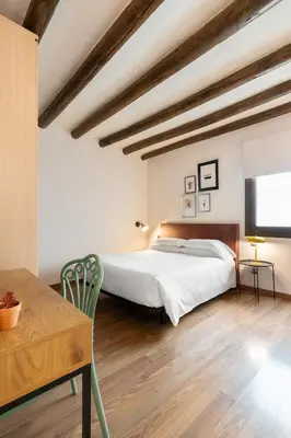 Cama o camas de una habitación en Hostal Pichorradicas
