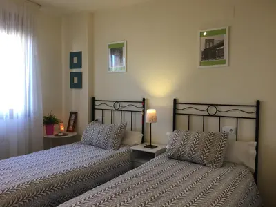 Cama o camas de una habitación en BIOK Ainsa Ordesa-Monte Perdido'