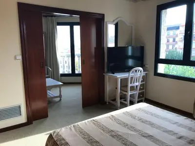 Una televisión o centro de entretenimiento en Hotel Magallón
