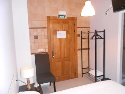 Cama o camas de una habitación en Hospedaje Nuestra Señora de Ujue