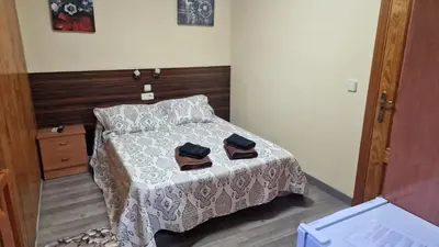 Cama o camas de una habitación en Hostal Escarla
