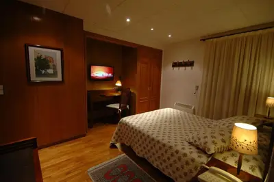 Cama o camas de una habitación en Hotel Els Puis