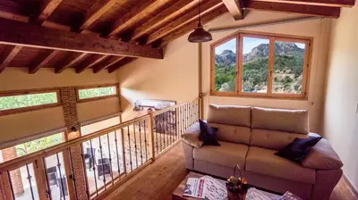 Zona de estar de Masia El Mirador del Tiempo