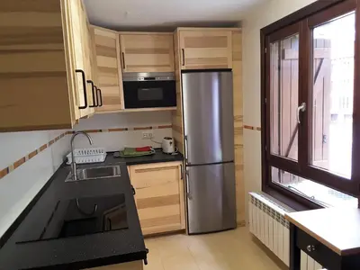 Una cocina o zona de cocina en Apartamentos Argualas
