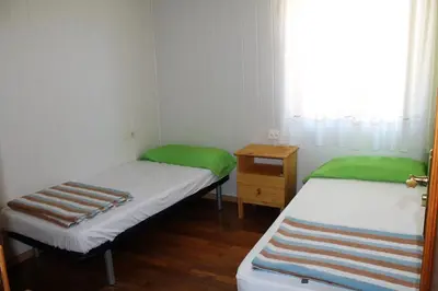 Cama o camas de una habitación en La Bodega Del Camino aka Albergue On TheLe