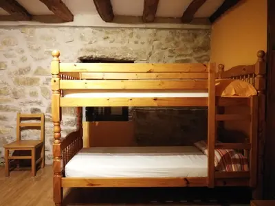 Cama o camas de una habitación en La Bodega Del Camino aka Albergue On TheLe