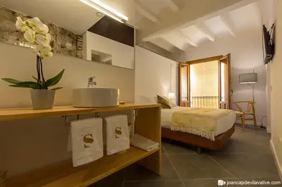Cama o camas de una habitación en Hotel Secrets Priorat