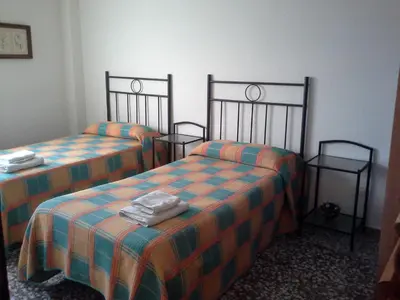 Cama o camas de una habitación en Pensión Lacasta