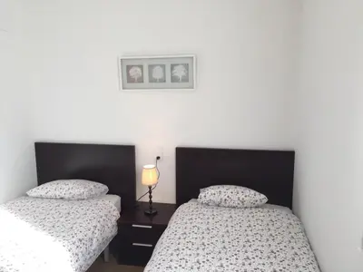 Cama o camas de una habitación en Apartamentos Panticosa