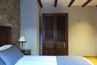 Cama o camas de una habitación en Apartamentos Casa Pochetas