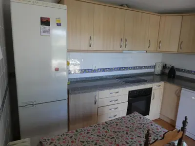 Una cocina o zona de cocina en Casa con jardín frente ciudadela