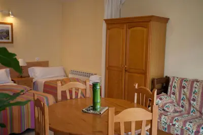 Zona de estar de Apartamentos Maribel