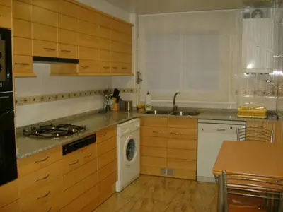 Una cocina o zona de cocina en Apartamentos Pirineos Ordesa II
