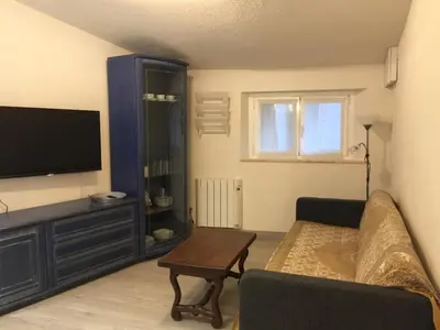 Una televisión o centro de entretenimiento en Apartamento Mañueta
